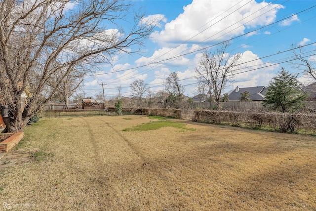 view of yard featuring fence