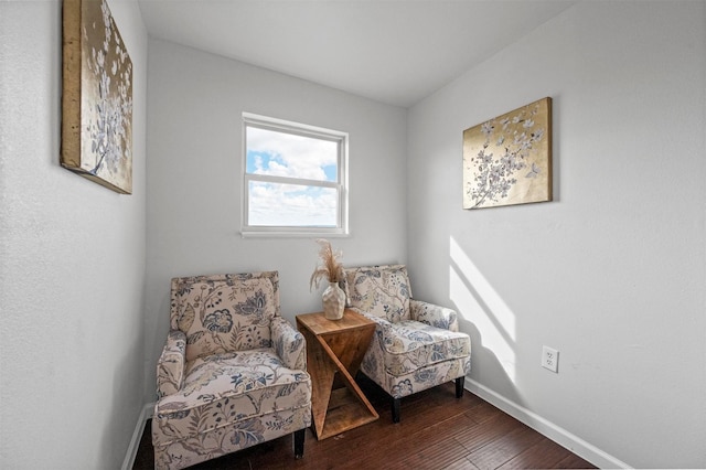 sitting room featuring hardwood / wood-style flooring and baseboards