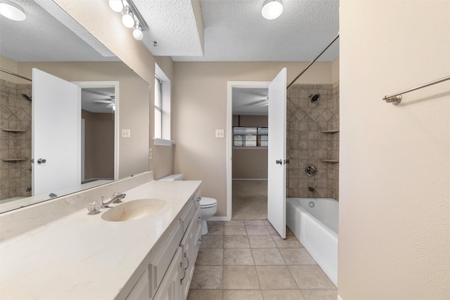 full bathroom with a textured ceiling, bathing tub / shower combination, tile patterned flooring, and vanity