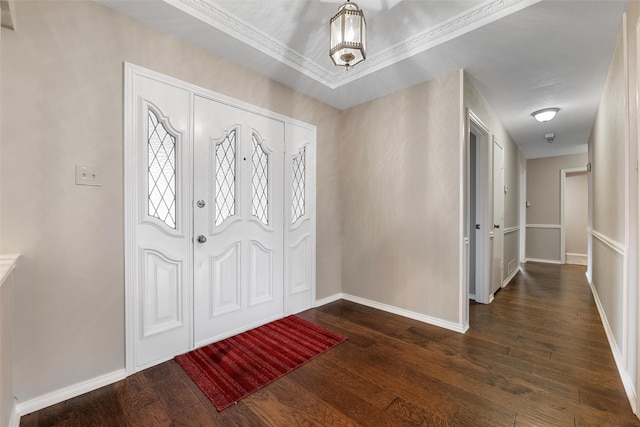 entryway featuring dark wood finished floors and baseboards