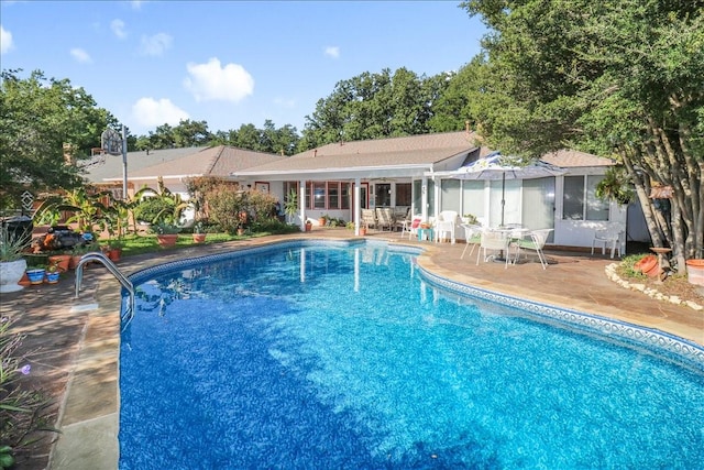 pool featuring a patio