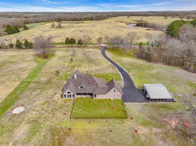 birds eye view of property featuring a rural view