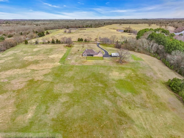 birds eye view of property featuring a rural view