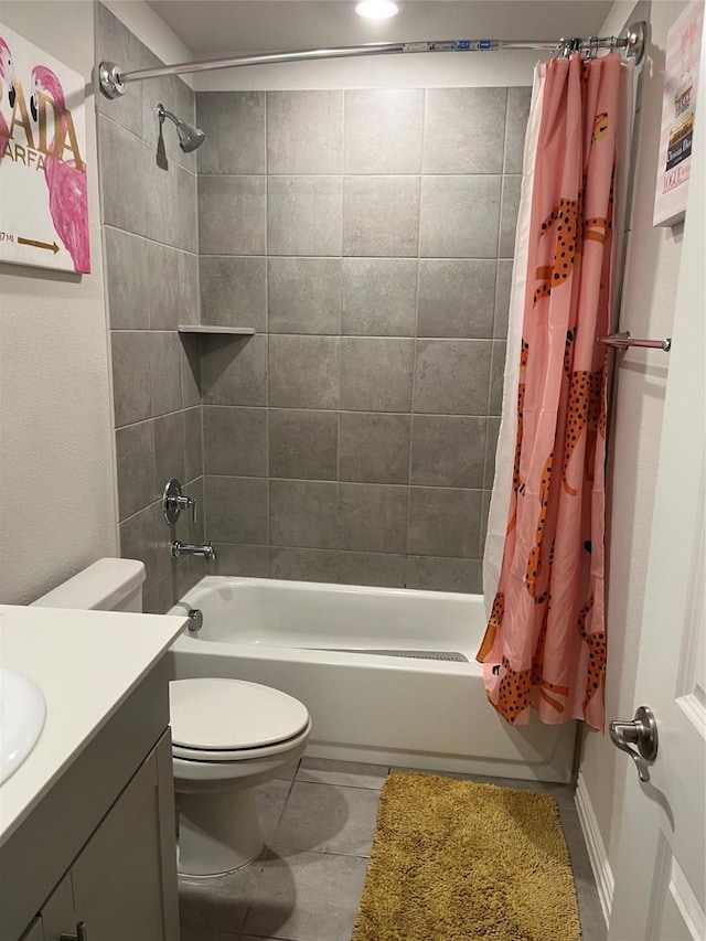 full bath featuring toilet, tile patterned flooring, shower / tub combo with curtain, and vanity