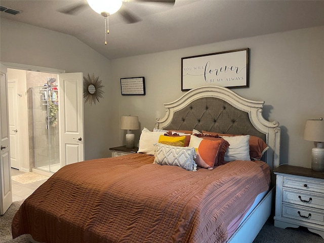 carpeted bedroom with lofted ceiling, visible vents, and ceiling fan