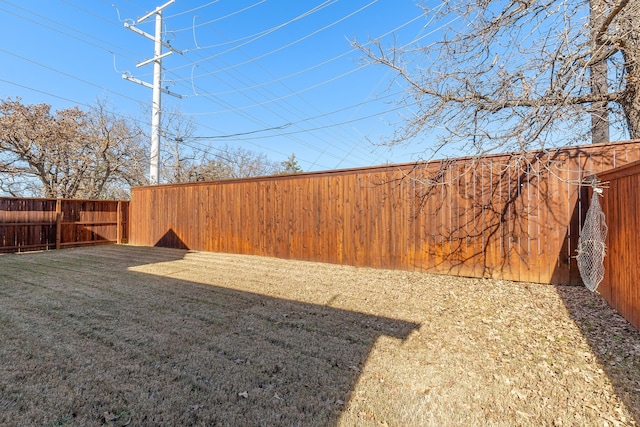 view of yard featuring a fenced backyard