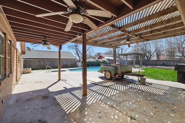 view of patio / terrace with a ceiling fan, a fenced backyard, and a pergola