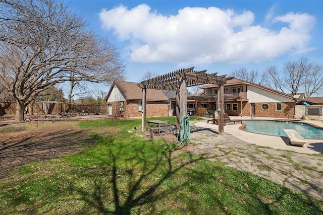 view of swimming pool featuring a pergola, fence, a yard, a fenced in pool, and a patio area