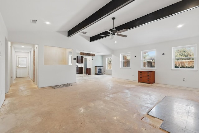 unfurnished living room with visible vents, concrete floors, lofted ceiling with beams, and ceiling fan