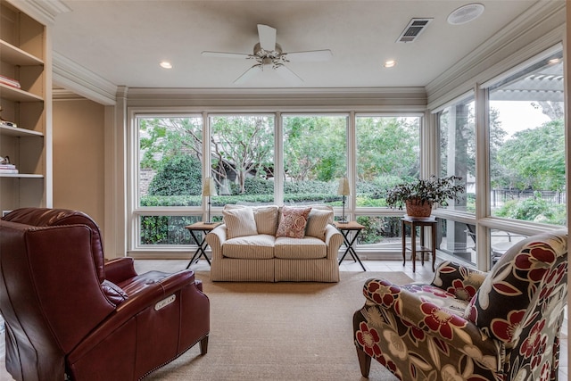 sunroom / solarium featuring visible vents and ceiling fan