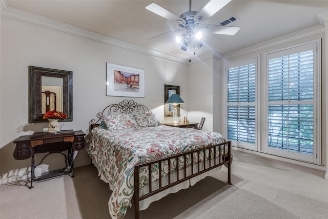 bedroom featuring carpet, visible vents, ceiling fan, and ornamental molding