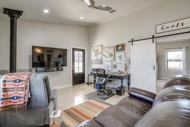 living room featuring recessed lighting, visible vents, a barn door, ceiling fan, and baseboards