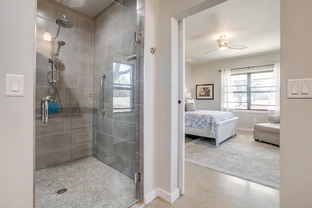 ensuite bathroom with a shower stall, baseboards, and ensuite bathroom