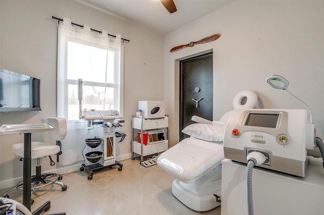 bedroom with ceiling fan and baseboards