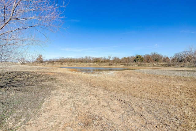 view of yard with a water view