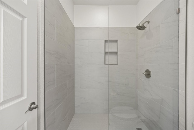 bathroom with a stall shower