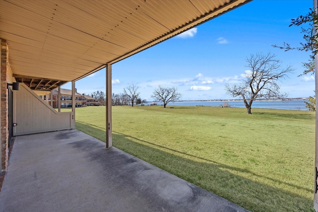 view of patio / terrace featuring a water view