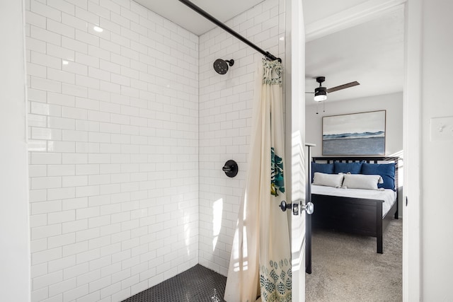 bathroom with ensuite bath, ceiling fan, and tiled shower