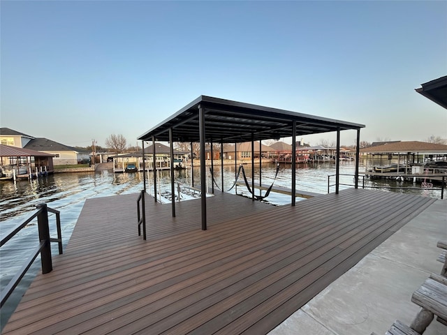 view of dock featuring a water view and boat lift