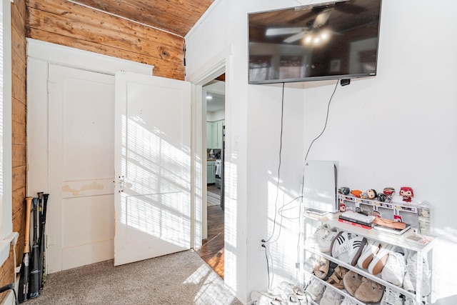 interior space featuring wooden ceiling