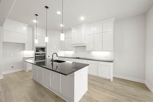 4814 Nomad Dr, Midlothian, TX 76065 - kitchen with a sink, baseboards, recessed lighting, dark countertops, and appliances with stainless steel finishes