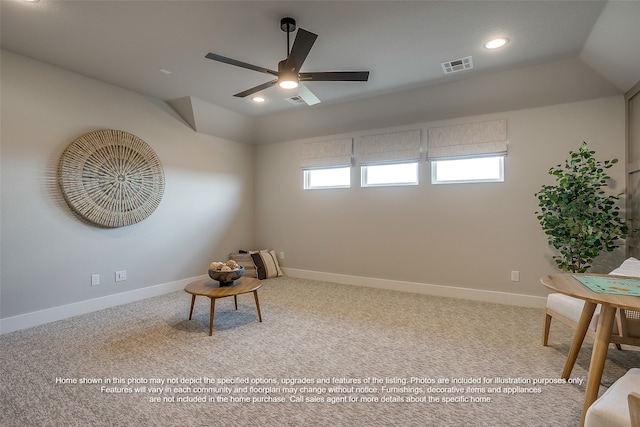 living area with carpet floors, visible vents, plenty of natural light, and baseboards