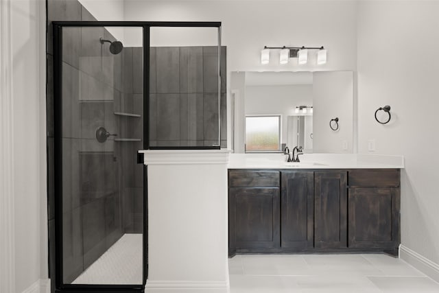 4814 Nomad Dr, Midlothian, TX 76065 - full bathroom with vanity, a stall shower, baseboards, and tile patterned floors