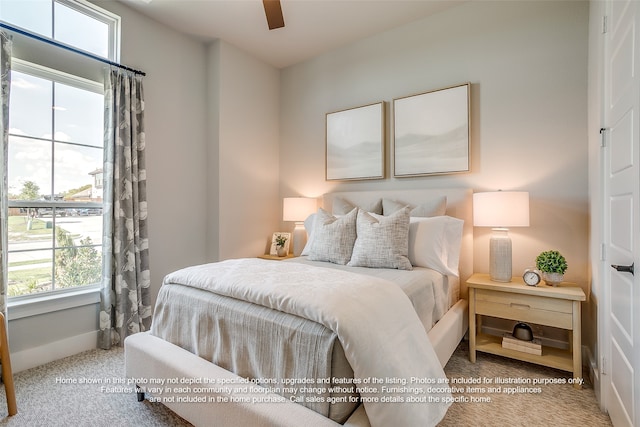 bedroom featuring a ceiling fan, carpet flooring, and baseboards