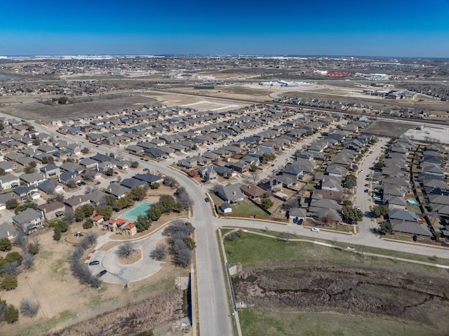 birds eye view of property with a residential view