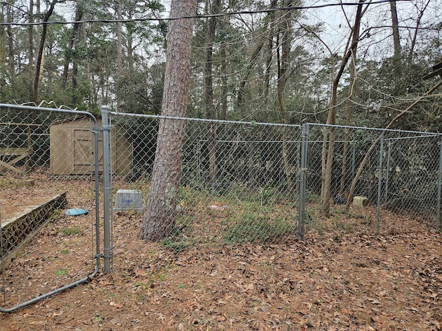 view of yard featuring a gate and fence