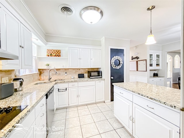 kitchen with black appliances, white cabinetry, visible vents, and a sink