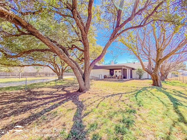 view of yard with fence