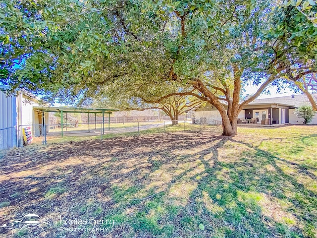 view of yard with fence