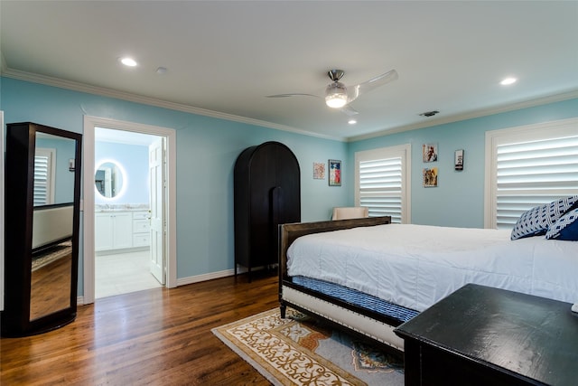 bedroom featuring dark wood-type flooring, recessed lighting, visible vents, and crown molding