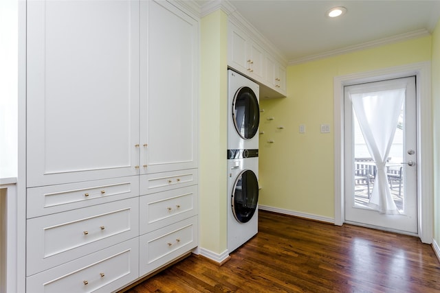 clothes washing area featuring baseboards, dark wood-style floors, ornamental molding, stacked washer / drying machine, and recessed lighting