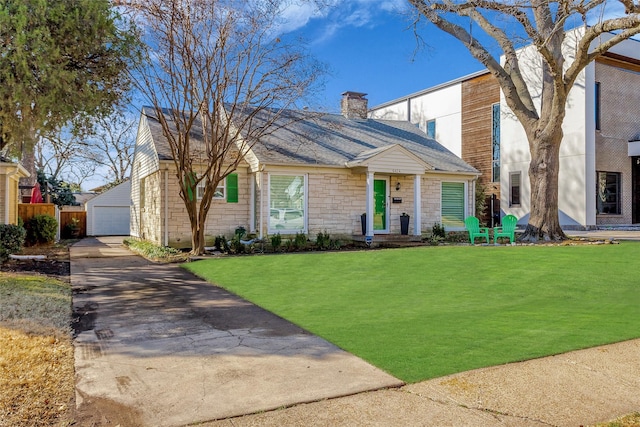 view of front of home featuring a garage, a shingled roof, stone siding, a chimney, and a front yard