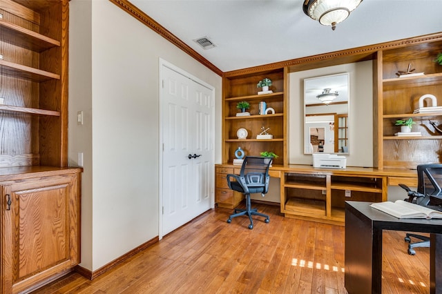 2701 Shadow Dr W, Arlington, TX 76006 - office space with visible vents, built in study area, baseboards, ornamental molding, and light wood-style flooring