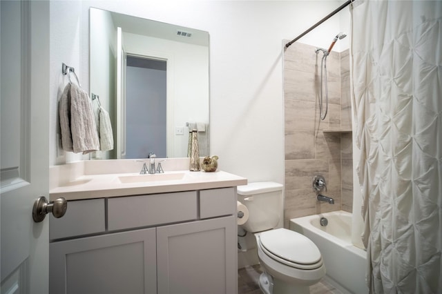 full bath featuring shower / bath combo, visible vents, vanity, and toilet