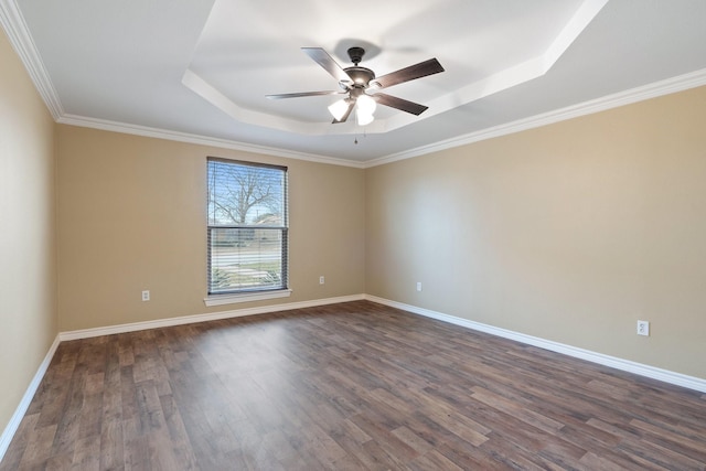 unfurnished room featuring a raised ceiling, baseboards, and dark wood-style flooring