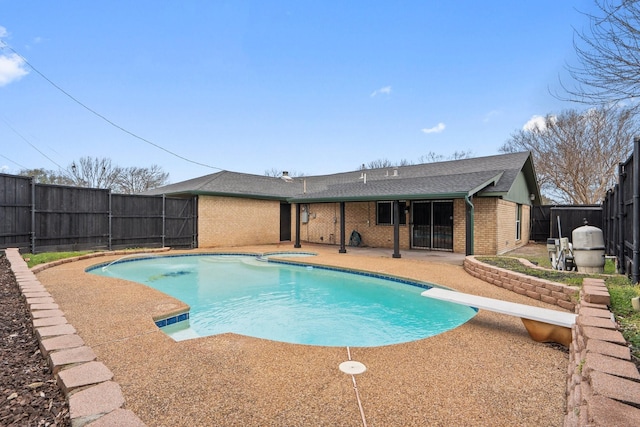 view of swimming pool featuring an in ground hot tub, a fenced backyard, a fenced in pool, and a patio