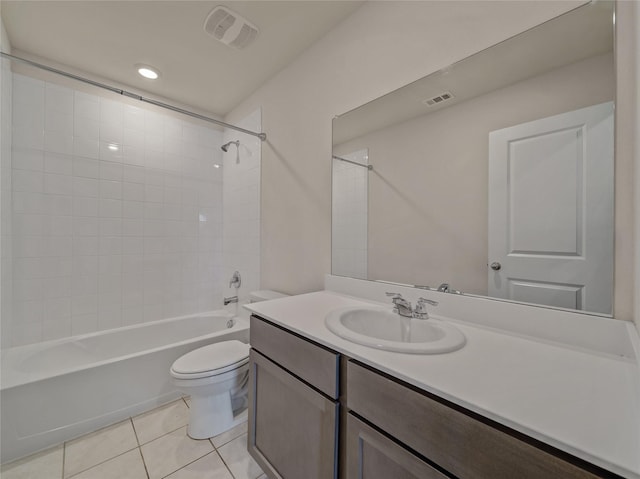 full bathroom featuring tile patterned flooring, toilet, vanity, visible vents, and shower / bathing tub combination