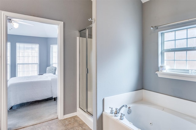 full bathroom featuring a ceiling fan, a stall shower, ensuite bath, tile patterned flooring, and a tub with jets