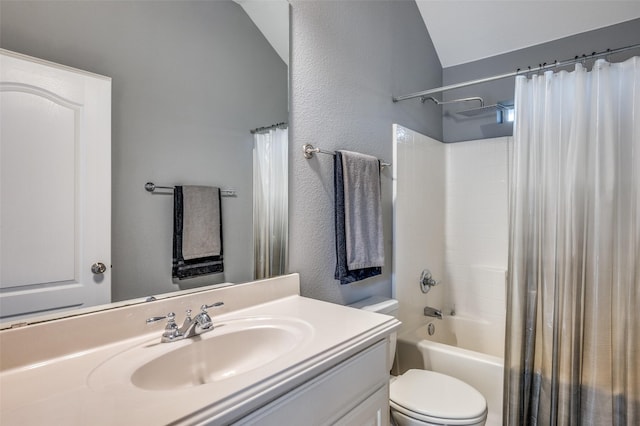 bathroom with toilet, a textured wall, shower / tub combo, and vanity