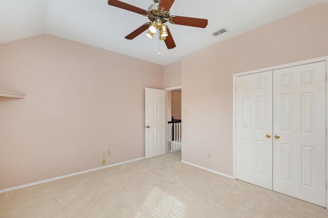 7100 Amethyst Ln, Plano, TX 75025 - unfurnished bedroom featuring light carpet, a closet, baseboards, vaulted ceiling, and a ceiling fan