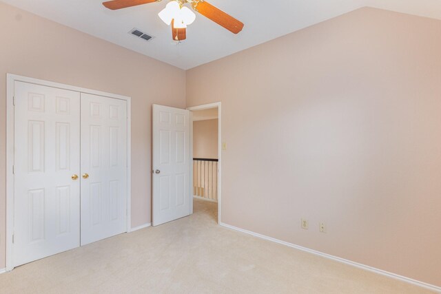 7100 Amethyst Ln, Plano, TX 75025 - unfurnished bedroom with light colored carpet, a closet, baseboards, and a ceiling fan