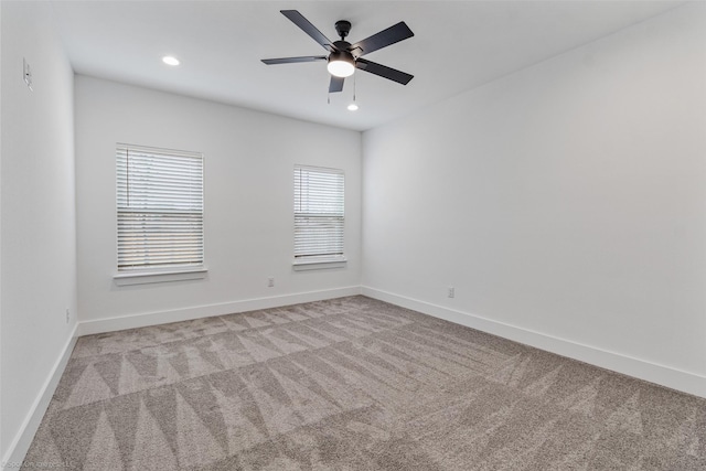 unfurnished room featuring carpet floors, ceiling fan, baseboards, and recessed lighting