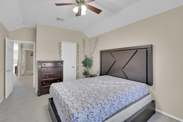 bedroom featuring ceiling fan, light carpet, visible vents, baseboards, and vaulted ceiling