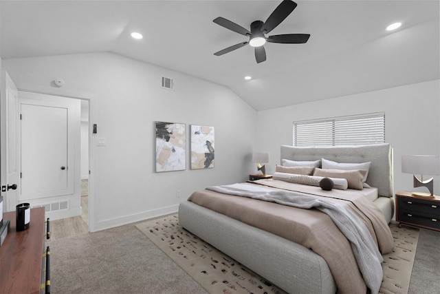 bedroom featuring vaulted ceiling, visible vents, and recessed lighting