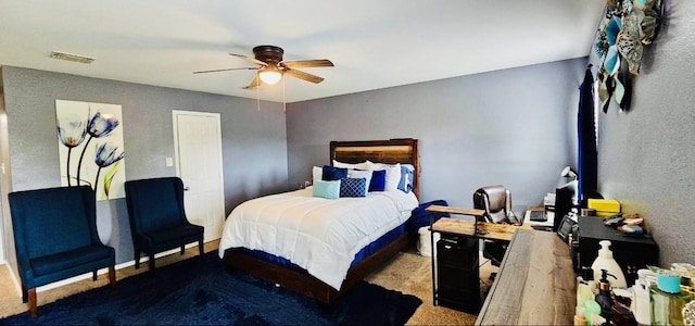 bedroom featuring ceiling fan, visible vents, and carpet flooring