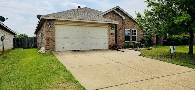 view of front of home featuring fence, concrete driveway, brick siding, a front yard, and a garage